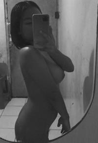 Karisma taking a selfie and - breasts