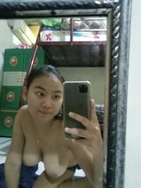 Karisma taking a selfie and - breasts