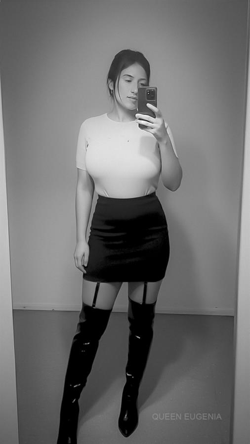 Pornstar Queen Eugenia in incredible thigh-high boots.
