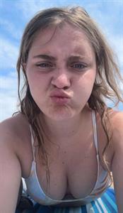 Kylieschuch in a bikini taking a selfie