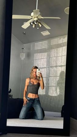 Rachel taking selfies of Rachel