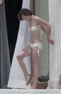 Milla Jovovich in a bikini