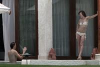 Milla Jovovich in a bikini