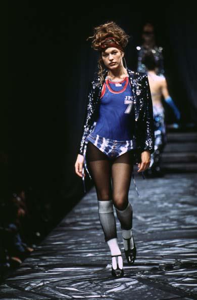 Milla Jovovich in a bikini in body paint - breasts