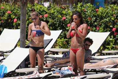 Alex Morgan and Sydney Leroux in bikinis on the beach in Hawaii