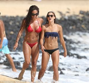 Alex Morgan and Sydney Leroux in bikinis on the beach in Hawaii