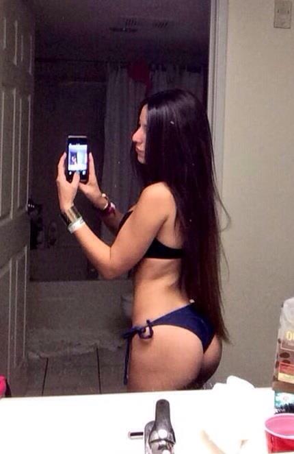 Angie Varona in a bikini taking a selfie and - ass