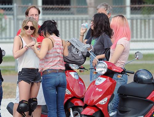 Selena Gomez Pictures Selena Gomez rides a scooter on set of spring breakers on February 29, 2012