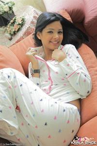 Karla Spice takes off her white pyjamas