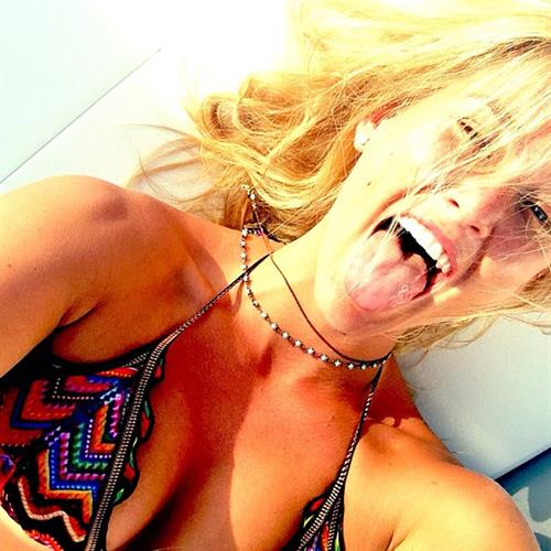 Bar Refaeli in a bikini taking a selfie