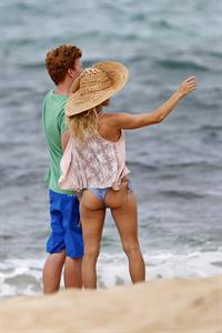 Pamela Anderson Takes a walk in bikini bottoms on the Island of Maui December 30, 2012 